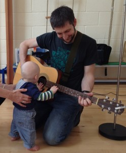 Ross and Isaac playing guitar